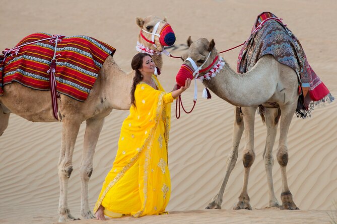 High Red Dunes with Camel Ride, Sandboarding, Falcon Show and VIP BBQ Dinner - Sunset changes the pace
