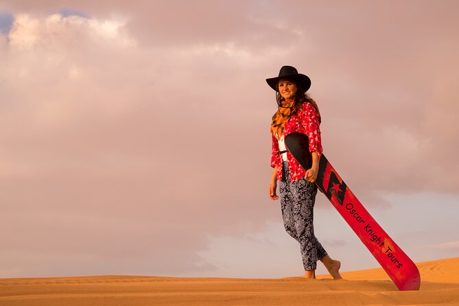 High Red Dunes with Camel Ride, Sandboarding, Falcon Show and VIP BBQ Dinner - Belly dancing, Tanoura, and the evening show