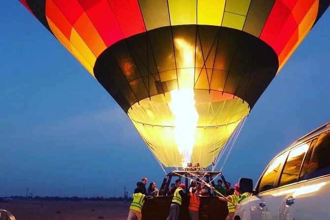 Hot Air Balloon Ride Over Dubai Desert inlcuding Transfers - Watching the balloon inflate before sunrise