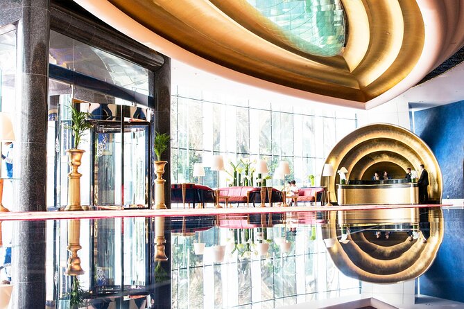 Inside Burj Al Arab Dubai Guided Tour with Experience Package - The vast atrium and fountain display