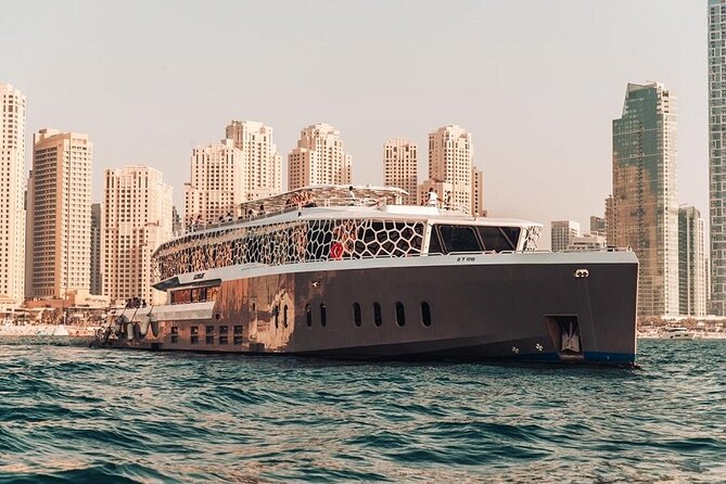 Lotus Mega Yacht Luxury Cruise with Live DJ, Dinner & Transfers - Burj Al Arab after dark