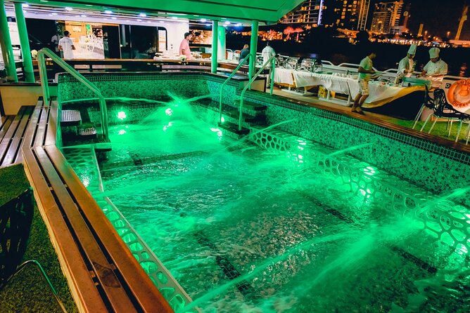 Lotus Mega Yacht Luxury Cruise with Live DJ, Dinner & Transfers - DJ music, dancing, and the onboard mood