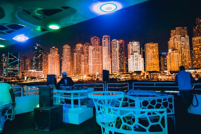 Lotus Mega Yacht Luxury Cruise with Live DJ, Dinner & Transfers - Pool, jacuzzis, decks, and VIP seating
