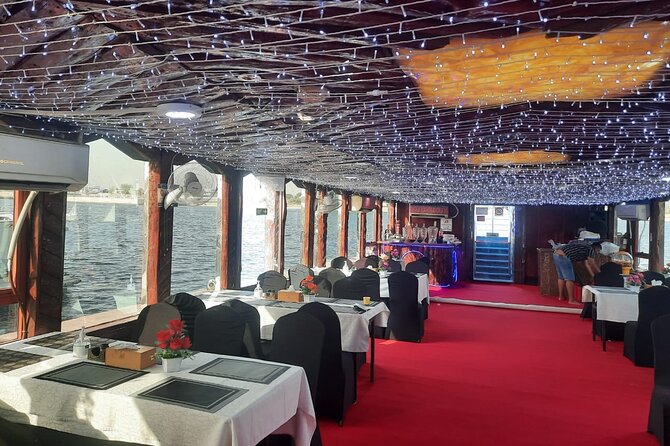 Marina Dhow Cruise with BBQ Dinner and Live shows - Setting out from Dubai Marina at night
