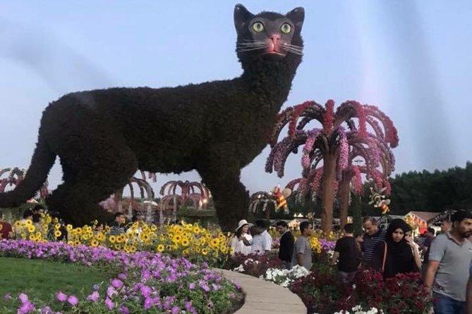 Miracle Garden & Butterfly Garden with Ticket & Private Transfers - Inside the Butterfly Garden’s cool domes