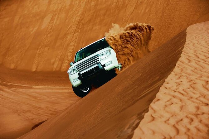Morning Desert Safari Dubai with Dune Bashing and Sand Boarding - Lahbab and the first high-dune photo stop