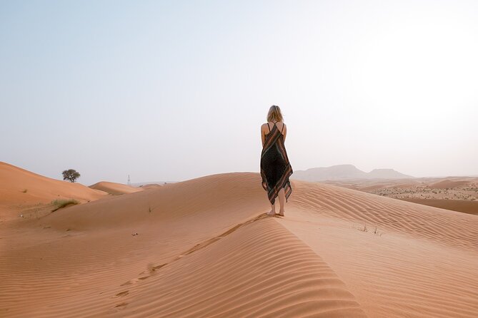 Morning Desert Safari From Abu Dhabi -Camel Ride,Sand Boarding,Camel Farm Visit - Sandboarding on the soft slopes