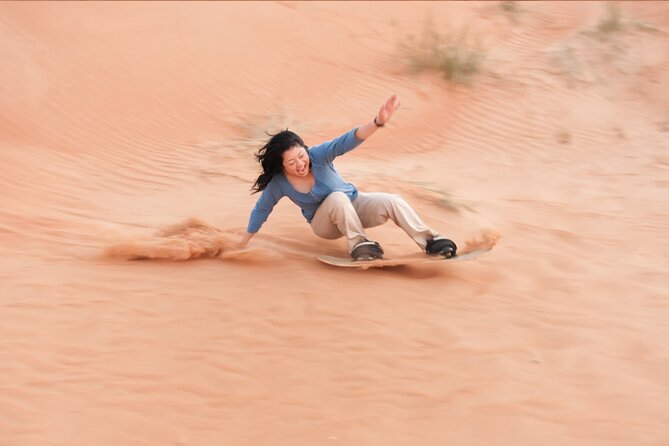 Morning Desert Safari plus Quad Bike, Sandboard and Camel ride - Water, soft drinks, and the practical side of heat