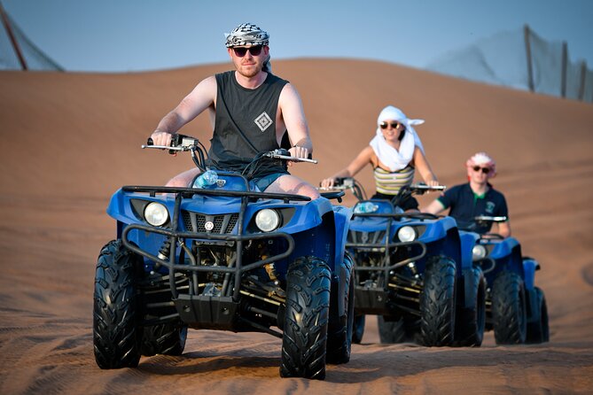 Morning Desert Safari, Quad Bike, Sandboard and Camel Ride - Quad biking in the fenced desert area