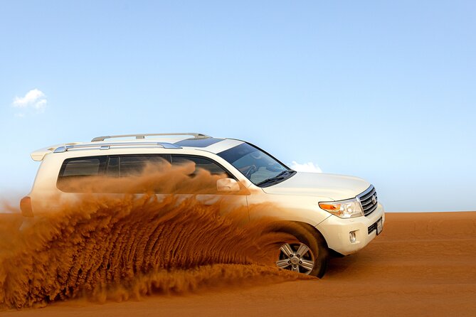Morning Desert Safari, Quad Bike, Sandboard and Camel Ride - Dates, Arabic coffee, and the return journey