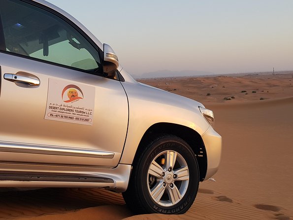 Morning Desert Safari with Camel Ride and Sandboarding - Sandboarding on the red dunes