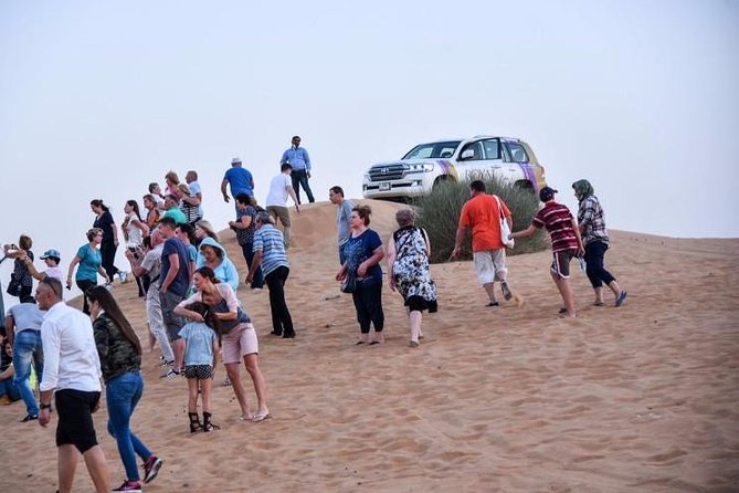 Morning Desert Safari With Quad Bike & Camel Ride Experience - Hotel pickup and the ride to the sand