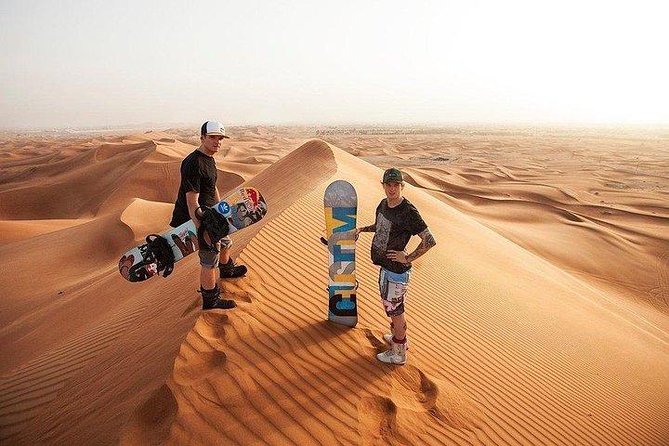 Morning Desert Safari with Quad Bike, Camel Ride & Sandboarding - Lahbab’s red dunes are the real setting
