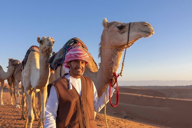 Morning Desert Safari with Quad Bike, Camel Ride & Sandboarding - Pickup and group size shape the experience
