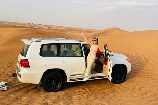 Morning Desert Safari with Sandboarding & Camel Ride on Red Dunes - Sandboarding on the High Dunes