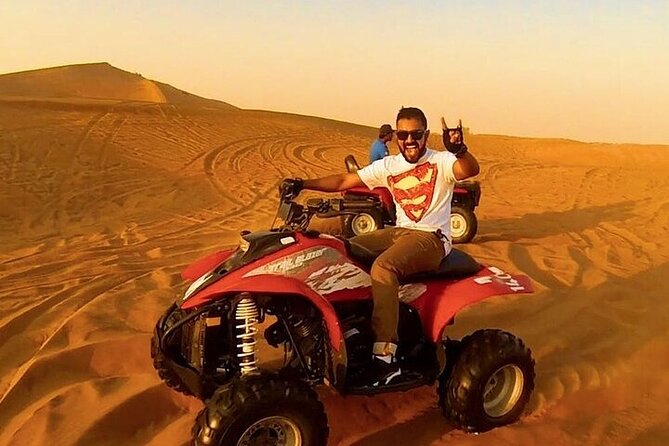 Morning Desert Thrill: Dune Bashing, 30min Quad Bike & Camel Ride - A 15-minute camel trek keeps the tradition brief