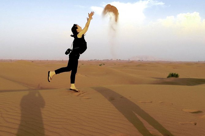 Morning Desert Thrill: Quad Bike Safari Escape - Sandboarding on the high red dunes