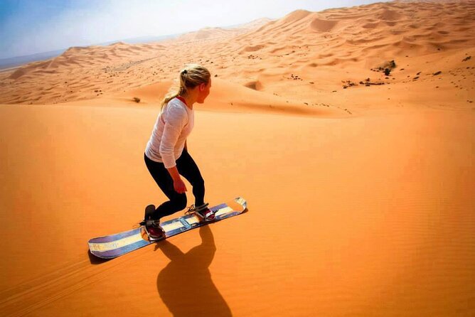 Morning Dune Bashing with Camel Trekking and sand boarding - Photos, falcons, and what is not guaranteed