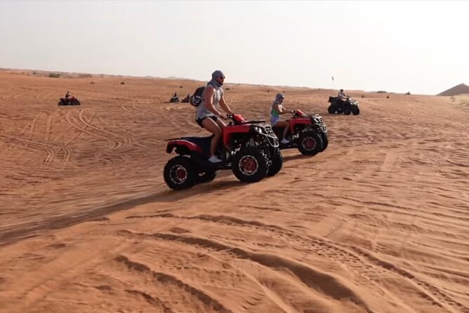 Morning/Evening 4x4 Desert Safari, CamelRide & Sandboarding - Morning light, evening color, and photo stops