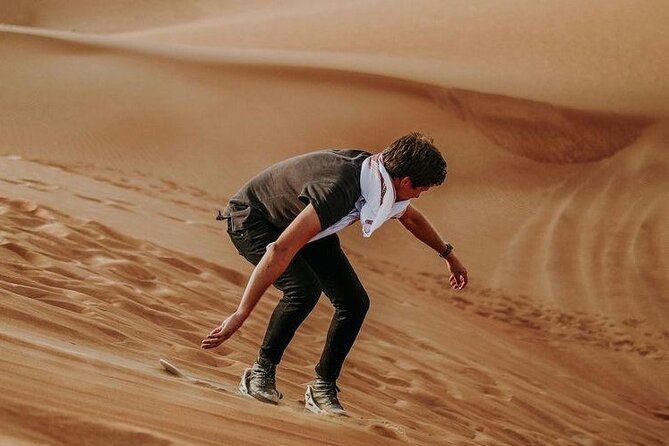Morning Quad Biking & Red Sand Desert Safari , Camel Ride, Sand Boarding - A short camel ride with a traditional touch