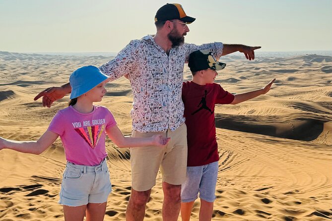 Morning Red Dune Safari with Sandboarding and Camel Ride - Sandboarding on the red dunes