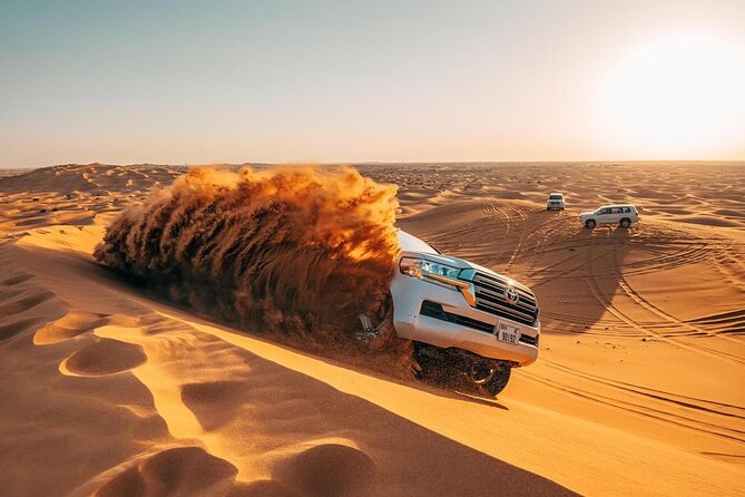 Morning Red Dunes Safari: Camel Ride & Sandboarding Adventure - Pickup from your hotel or residence in Dubai