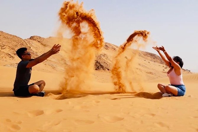 Morning Red Dunes with Camel Ride, Sandboarding and Refreshments - The guide makes or breaks the morning