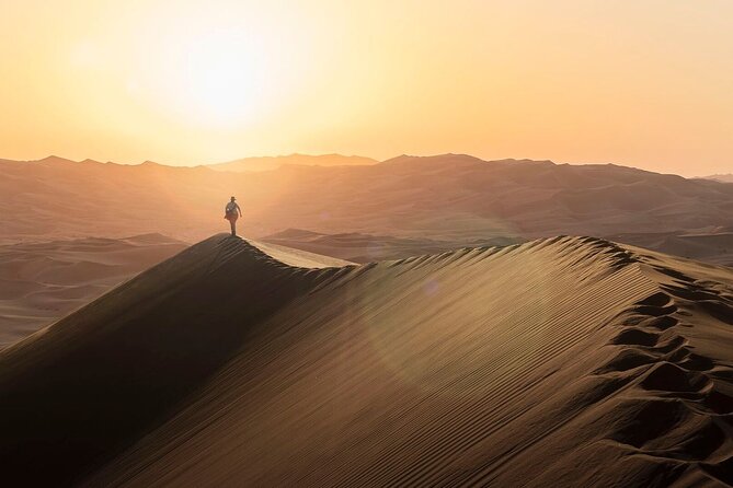 Morning Red Sand Desert Safari with Camel Ride & Sand Boarding - Pickup from Dubai or Sharjah in an air-conditioned 4x4