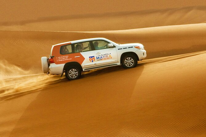 Morning Safari with Camel Ride and Quad Bike Single Seater - Leaving Dubai’s towers for the red dunes