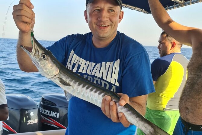 Nanje Fishing Trips Dubai - Swimming, sun decks, and the yacht setup