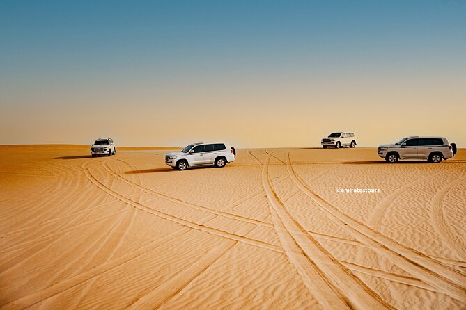 Overnight Desert Safari with BBQ Dinner & Breakfast Abu Dhabi - Camels, photos, and a desert sunset