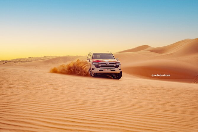 Overnight Desert Safari with BBQ Dinner & Breakfast Abu Dhabi - Belly dance, tanoura, and fire performances