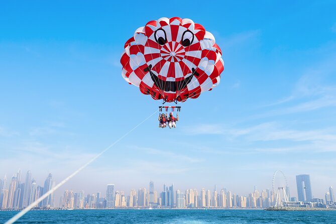 Parasailing in Dubai with Palm Jumeirah and JBR Beach views - Key points to know before you book