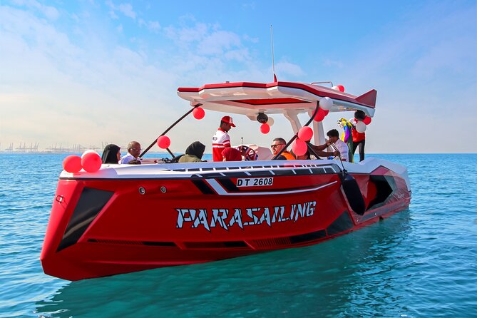 Parasailing in Dubai with Palm Jumeirah and JBR Beach views - From Dubai Harbour to the open water