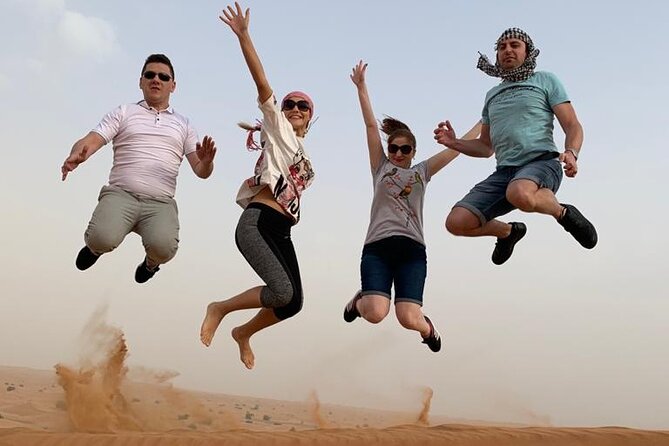 Premium Evening Desert Safari, Quad Bike, Camel & VIP BBQ Dinner - The Al Aweer camp after sunset