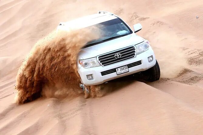 Premium Evening Desert Safari, Quad Bike, Camel & VIP BBQ Dinner - Dune bashing across Lahbab