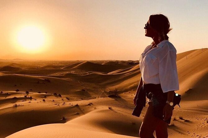 Premium Red Dunes Safari | Camel Ride | Dune Bashing | Sand Ski - Barbecue dinner and the evening shows