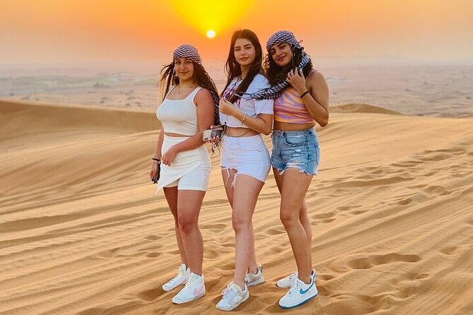 Private Evening Red Sand Desert Safari with BBQ Dinner - A short camel ride and traditional welcome