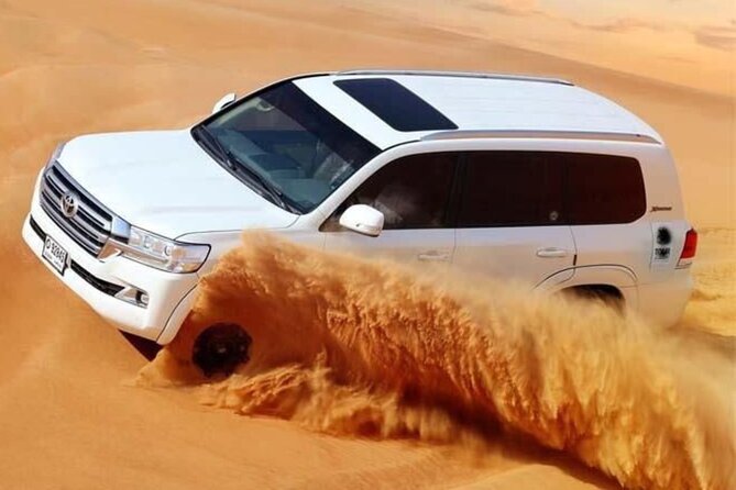 Private Morning Desert Safari Dune Bashing and Short Camel Ride - Sandboarding on the red dunes