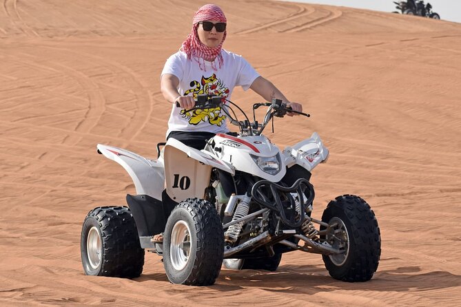 Quad Bike Tour with Camel Ride, Sandboarding, BBQ & Live Shows - Sandboarding offers a quick burst of fun