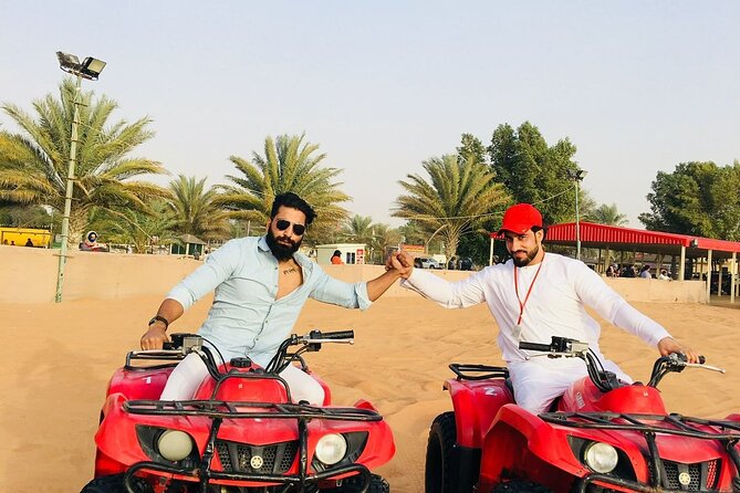 Quad Bike Tour with Camel Ride, Sandboarding, BBQ & Live Shows - Camel riding and the falcon encounter