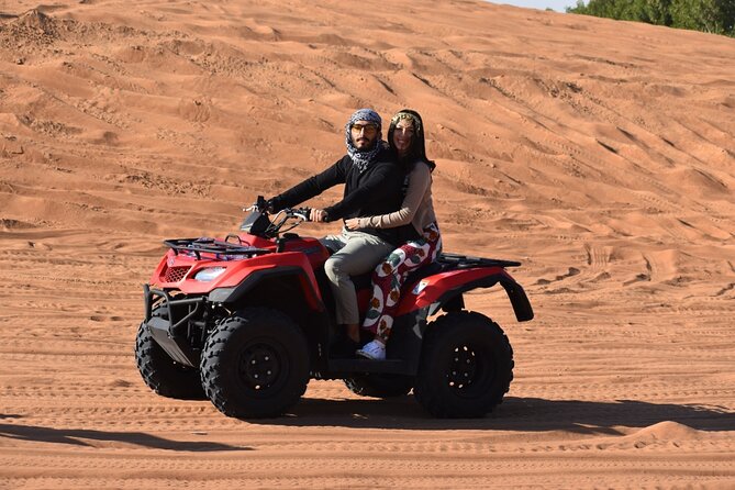 Quad Bike Tour with Camel Ride, Sandboarding, BBQ & Live Shows - Henna, dress-up, tea, and camp customs
