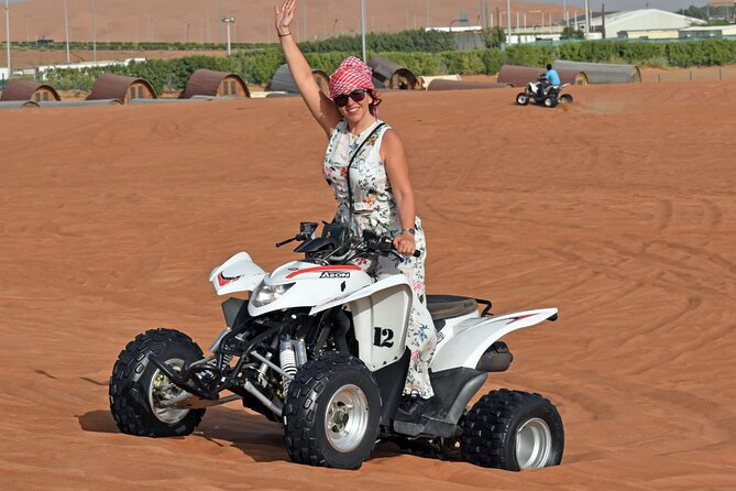 Quad Bike Tour with Camel Ride, Sandboarding, BBQ & Live Shows - The 4WD pickup keeps the evening simple