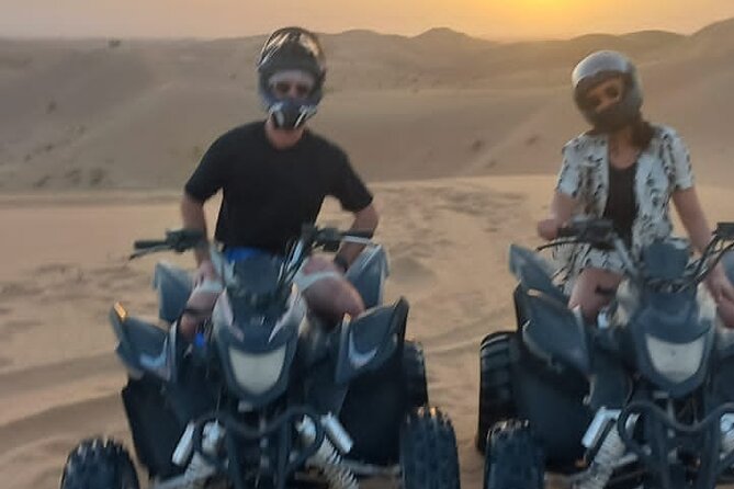 Quad biking tour with or without pick and drop(Abu dhbai ) - Arrival, instruction, and getting on the ATV