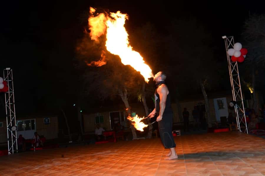 Ras Al Khaimah: Half-Day Desert Safari with Dinner - Sand boarding, camels and henna at The Dunes Camping & Safari RAK