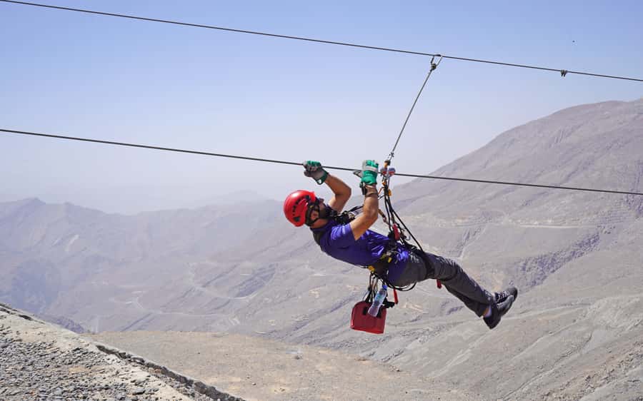 Ras al-Khaimah: Jais Sky Tour Zipline Adventure - Getting fitted for six mountain ziplines