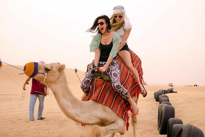 Red Dune Safari with Quad Bike Sand Boarding and Camel Ride - Quad biking across the dunes is the main attraction