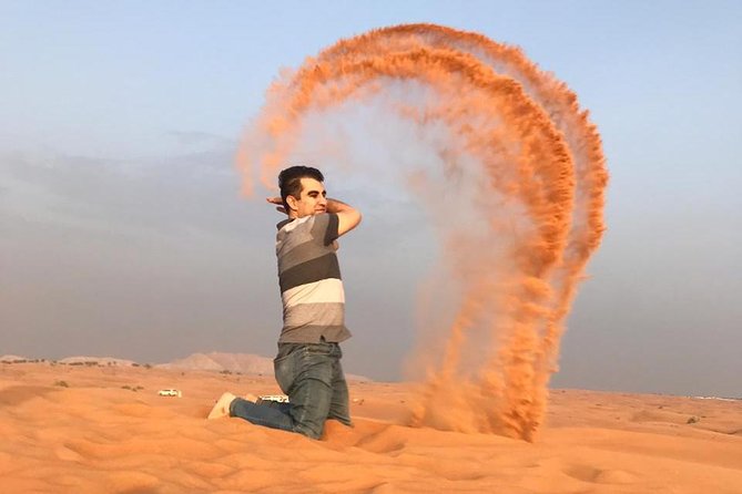 Red Dune Safari with Quad Bike Sand Boarding and Camel Ride - Sand boarding adds a quieter challenge