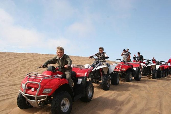 Red Dune Safari with Quad Bike Sand Boarding and Camel Ride - Photo stops are built into the route