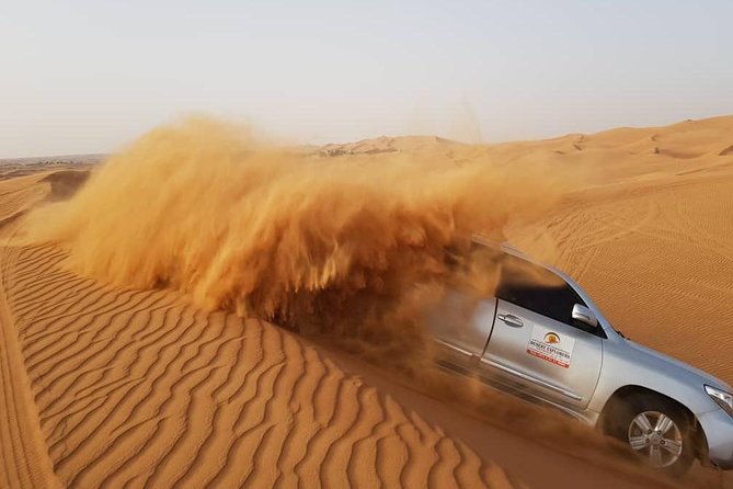 Red Dunes Desert Safari with BBQ Dinner - A short camel ride and traditional camp welcome